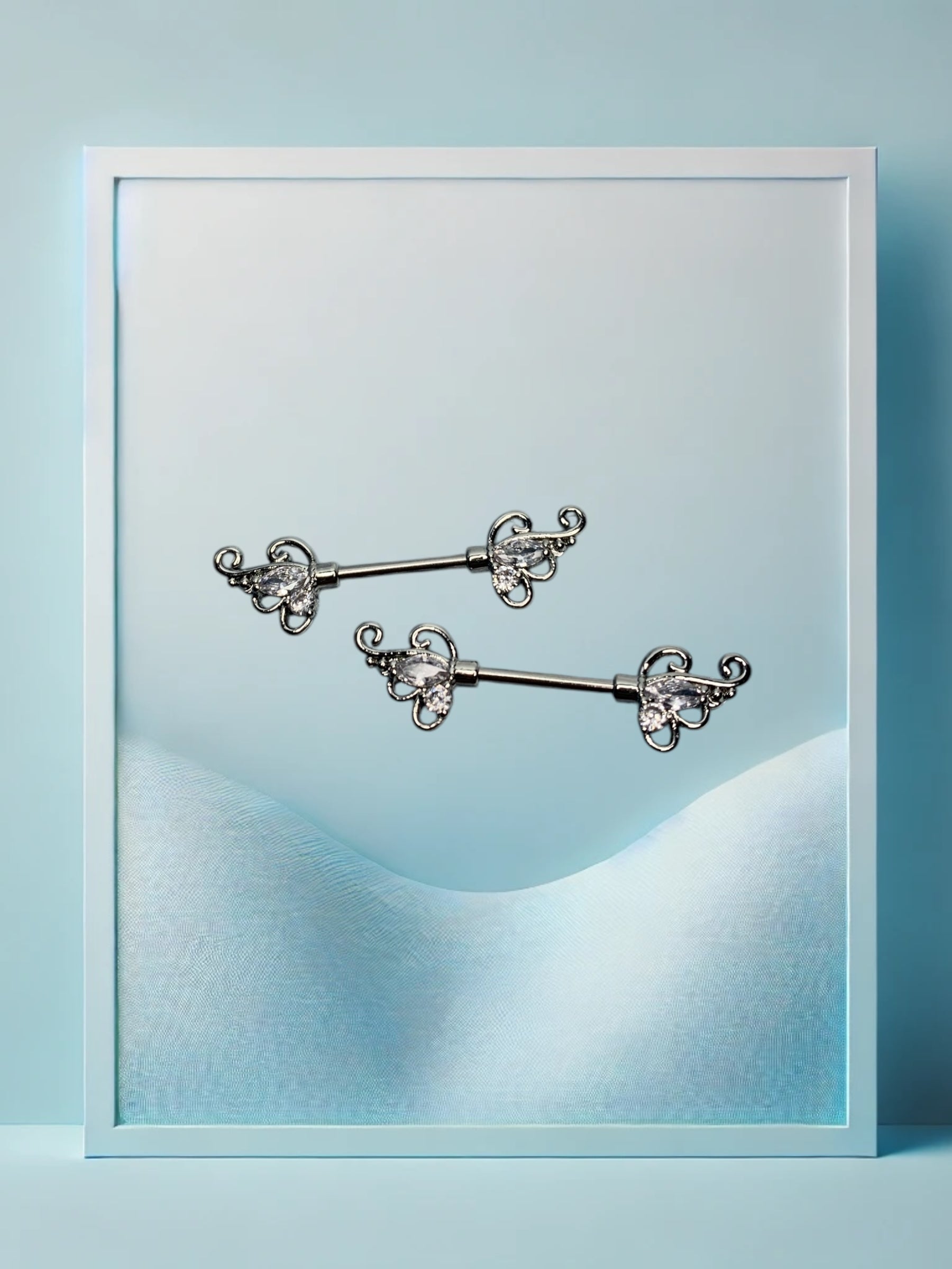 Double Wing Nippelpiercing - IcyBelly